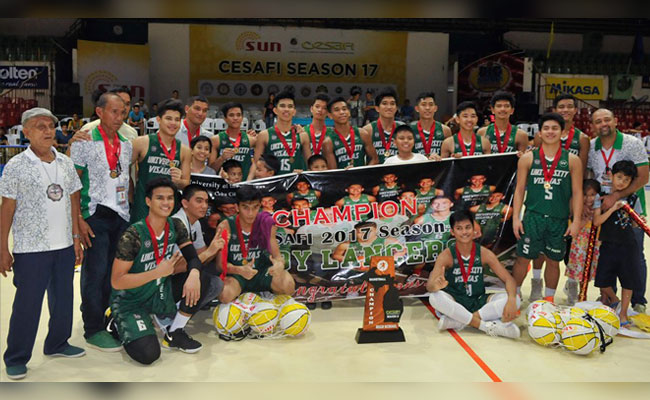 Champions again. Members of the UV Baby Lancers and their coaching staff celebrate their first Cesafi title since 2011. (SunStar Foto/Arni Aclao)